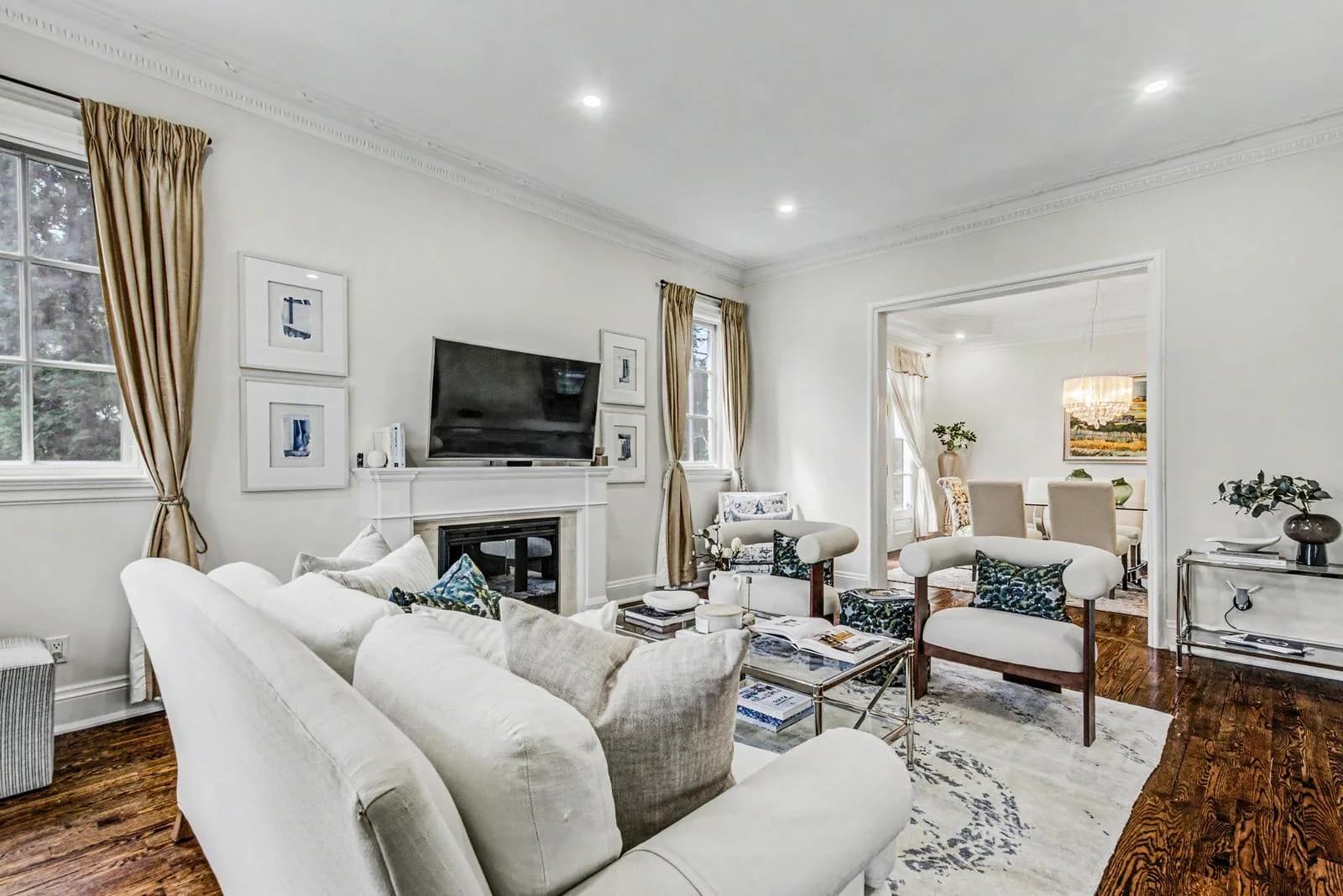 Living room seating and open doorway to the dining room at 200 Glenayr Road